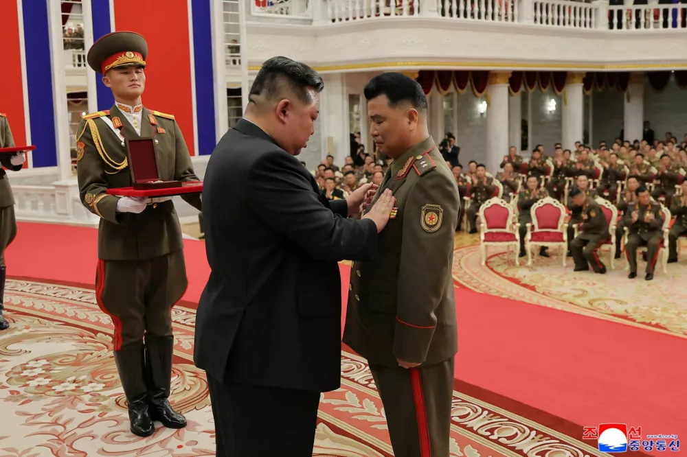 North Korean leader Kim Jong attends a national commendation ceremony for the commanders and fighters of the Korean People's Army's overseas operations unit, at the headquarters of the Central Committee of the Korean Workers' Party, in Pyongyang, North Korea, in this photo released on August 22, 2025 by North Korea's Korean Central News Agency (KCNA).&nbsp;KCNA&nbsp;via REUTERS ATTENTION EDITORS - THIS IMAGE WAS PROVIDED BY A THIRD PARTY. REUTERS IS UNABLE TO INDEPENDENTLY VERIFY THIS IMAGE. NO THIRD PARTY SALES. SOUTH KOREA OUT. NO COMMERCIAL OR EDITORIAL SALES IN SOUTH KOREA.