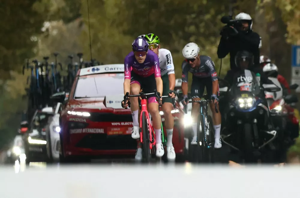 Cycling - Vuelta a Espana - Stage 2 - Alba to Limone Piemonte - Alba, Italy - August 24, 2025 Cyclists in action during stage 2 REUTERS/Manon Cruz