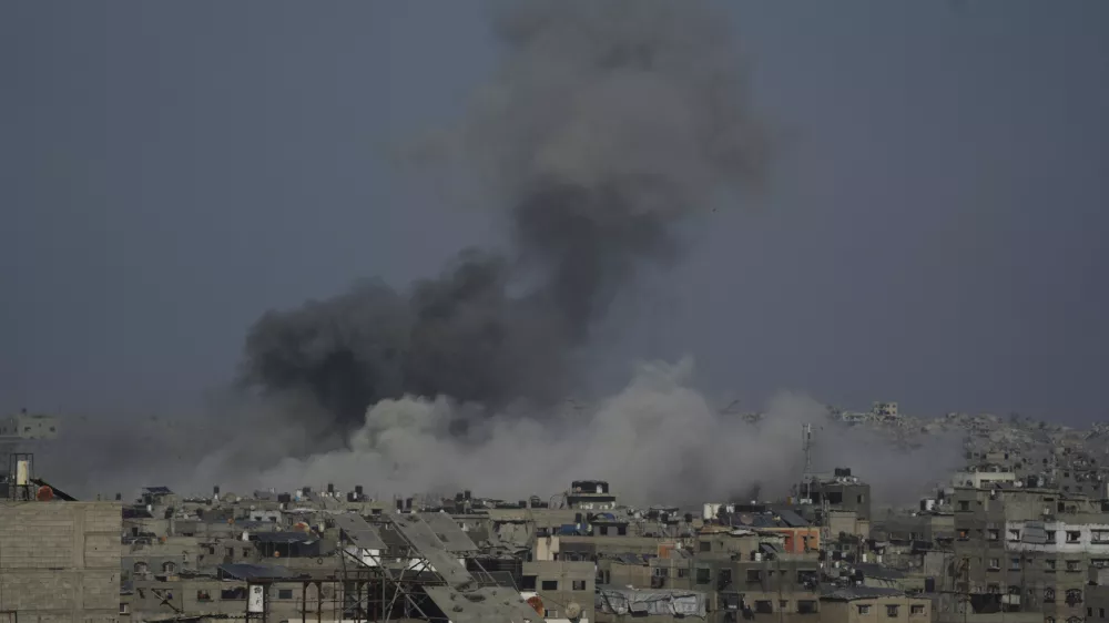 Smoke rises to the sky following an Israeli military strike in Gaza City, Sunday, Aug. 24, 2025. (AP Photo/Jehad Alshrafi)