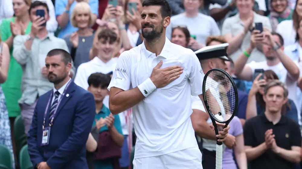 Tennis - Wimbledon - All England Lawn Tennis and Croquet Club, London, Britain - July 5, 2025 Serbia's Novak Djokovic celebrates after winning his third round match against Serbia's Miomir Kecmanovic REUTERS/Toby Melville