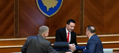 Attendees greet Dimal Basha, the newly elected speaker of Kosovo's parliament, following his election in Pristina, Kosovo August 26, 2025. REUTERS/Valdrin Xhemaj