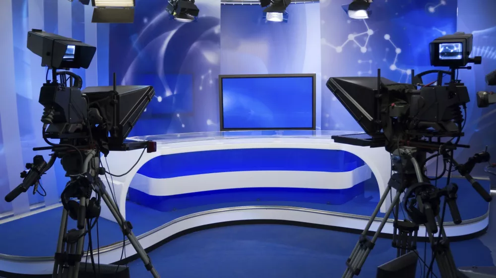 TV studio with camera and lights