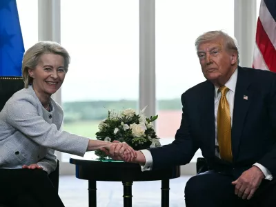 (FILES) US President Donald Trump (R) shakes hands with European Commission President Ursula von der Leyen (L) after agreeing on a trade deal between the two economies following their meeting, in Turnberry south west Scotland on July 27, 2025, on the third day of his visit to the country, since his second tenure as President began. US President Donald Trump ordered the reimposition of tariffs on dozens of trading partners on July 31, 2025 -- his cornerstone strategy for reshaping global trade to benefit the US economy. However in a minor reprieve, the White House said the measures will take effect in a week, not on August 1 as previously expected.,Image: 1027041292, License: Rights-managed, Restrictions:, Model Release: no