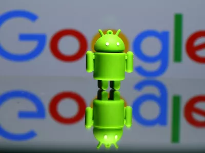 FILE PHOTO - A 3D printed Android mascot Bugdroid is seen in front of a Google logo in this illustration taken July 9, 2017. Picture taken July 9, 2017. REUTERS/Dado Ruvic/Illustration/r/File Photo