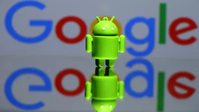 FILE PHOTO - A 3D printed Android mascot Bugdroid is seen in front of a Google logo in this illustration taken July 9, 2017. Picture taken July 9, 2017. REUTERS/Dado Ruvic/Illustration/r/File Photo