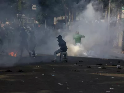29 August 2025, Indonesia, Jakarta: Students and online drivers gather in front of Brigade Mobile Police Jakarta, to demand the justice for the motorcycle taxi driver who died the night before. Photo: Donal Husni/ZUMA Press Wire/dpa