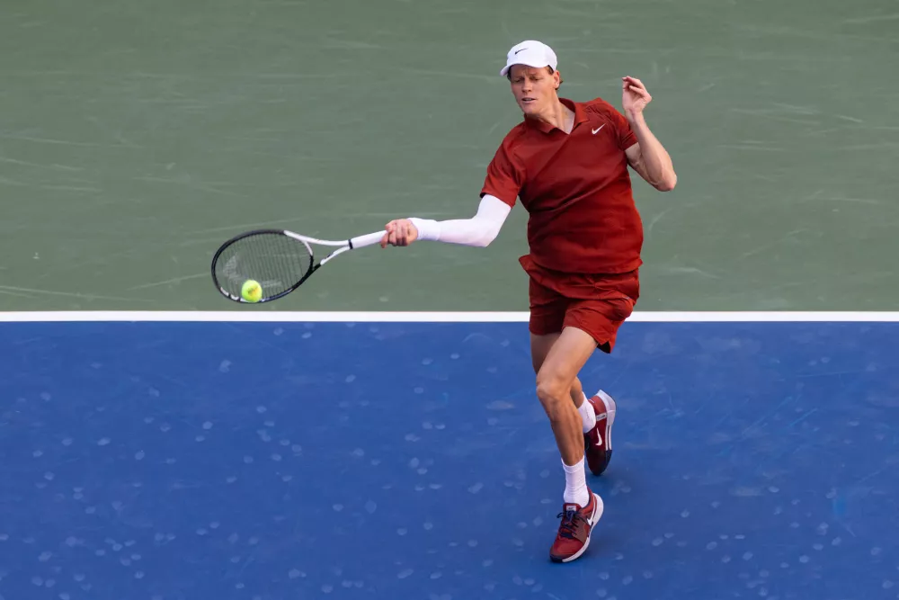 Aug 30, 2025; Flushing, NY, USA; Jannik Sinner of Italy in action against Denis Shapovalov of Canada in the third round of the menŐs singles at the US Open at Arthur Ashe Stadium in Billie Jean King National Tennis Center. Mandatory Credit: Mike Frey-Imagn Images