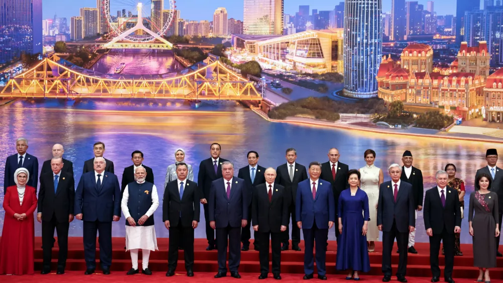 Leaders and officials, including Chinese President Xi Jinping and Russian President Vladimir Putin, attend a photo ceremony at the Shanghai Cooperation Organisation (SCO) summit in Tianjin, China August 31, 2025. Sputnik/Alexander Kazakov/Pool via REUTERS ATTENTION EDITORS - THIS IMAGE WAS PROVIDED BY A THIRD PARTY.