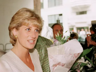 The Princess of Wales goes on a walkabout outside the Mortimer Market Centre in London, which she visited as patron of the National Aids Trust, Thursday June 27, 1996. The Princess heard about the latest developments in treatment and care for people with HIV/AIDS and she met staff and patients at the clinic. (AP Photo/Louisa Buller)