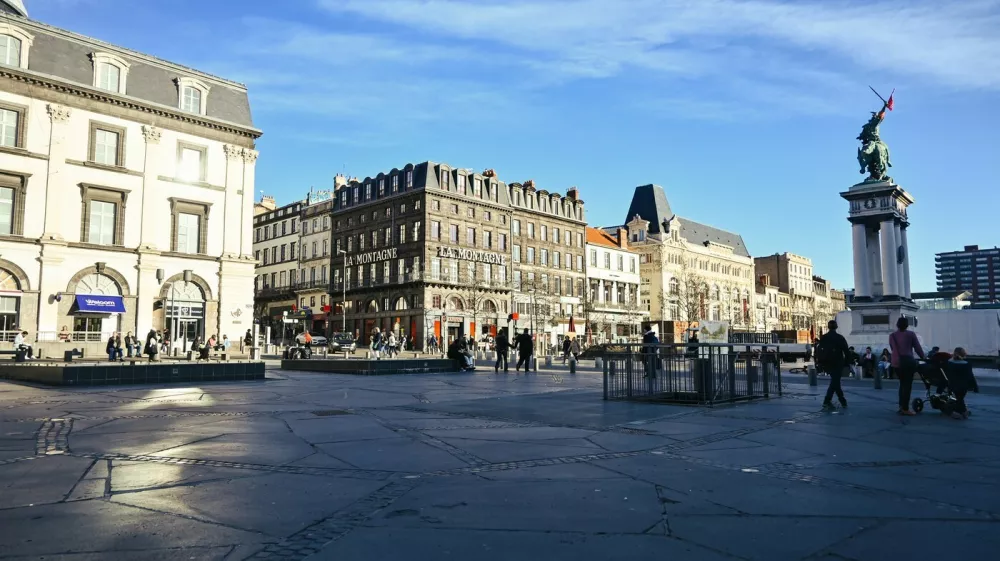 February 16, 2023, Clermont Ferrand, Auvergne Rhone Alpes, France: Near the main square of the city, the place de Jaude. On the right, the statue of Vercingetorix. Daily life in Clermont-Ferrand, central France. As the sun comes back and temperatures are rising, people are making the most of it by going out in the city.,Image: 756607032, License: Rights-managed, Restrictions:, Model Release: no