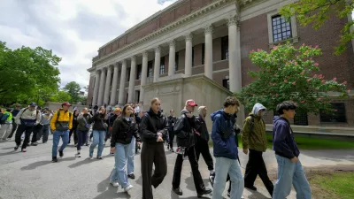 FILE PHOTO: Students from Quebec, Canada tour the campus of Harvard University in Cambridge, Massachusetts, U.S., May 23, 2025.  REUTERS/Faith Ninivaggi/File Photo