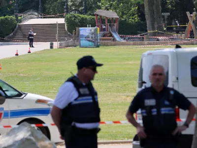 French police secure the area after several children and an adult have been injured in a knife attack in Annecy, in the French Alps, France, June 8, 2023. REUTERS/Denis Balibouse