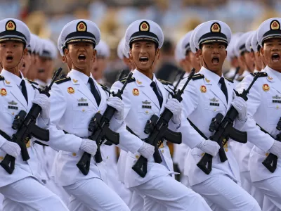 Members of Chinese People's Liberation Army (PLA) Navy march during the rehearsal ahead of a military parade to mark the 80th anniversary of the end of World War Two, in Beijing, China, September 3, 2025. REUTERS/Tingshu Wang