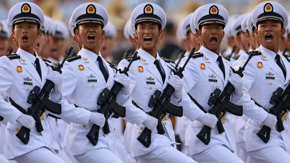 Members of Chinese People's Liberation Army (PLA) Navy march during the rehearsal ahead of a military parade to mark the 80th anniversary of the end of World War Two, in Beijing, China, September 3, 2025. REUTERS/Tingshu Wang