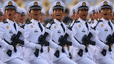 Members of Chinese People's Liberation Army (PLA) Navy march during the rehearsal ahead of a military parade to mark the 80th anniversary of the end of World War Two, in Beijing, China, September 3, 2025. REUTERS/Tingshu Wang