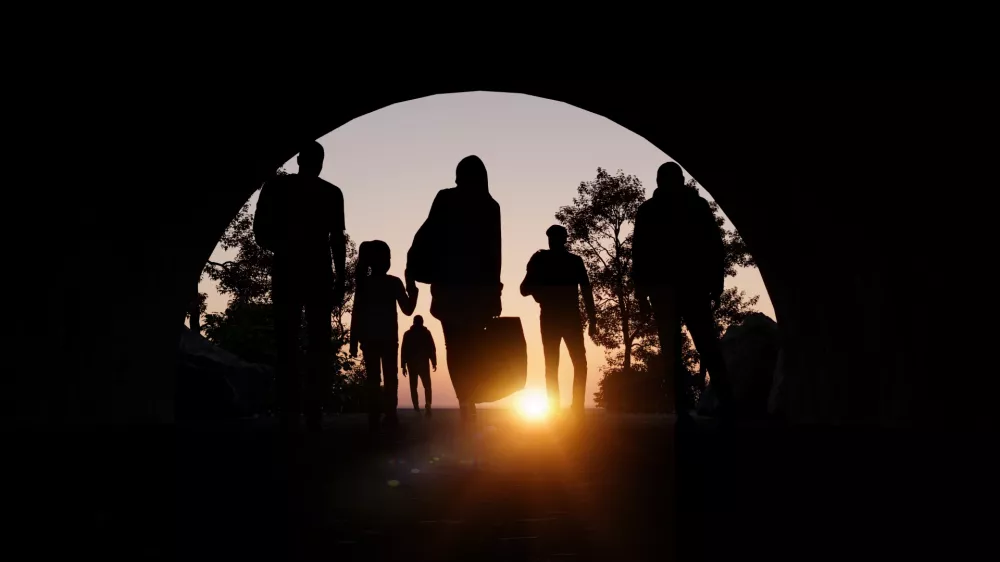 Refugees and immigrants looking for a new hope in life. Silhouette. Column of migrants passing through a tunnel. Abandon your lands for a better future. 3d rendering / Foto: Naeblys