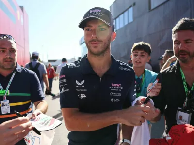 Formula One F1 - Italian Grand Prix - Autodromo Nazionale Monza, Monza, Italy - September 6, 2025 Alpine's Pierre Gasly signs autographs for fans as he arrives ahead of practice REUTERS/Jakub Porzycki