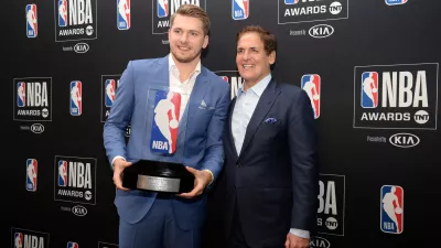 June 24, 2019; Los Angeles, CA, USA; Dallas Mavericks guard Luka Doncic poses with owner Mark Cuban following his award for Rookie Of The Year at the 2019 NBA Awards show at Barker Hanger. Mandatory Credit: Gary A. Vasquez-USA TODAY Sports - 12952404