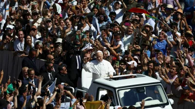 Pope Leo XIV greets the faithful after a Holy Mass for the canonisation of Carlo Acutis, a British-born Italian boy who became the first millennial to be made a Catholic saint, and Pier Giorgio Frassati, in St. Peter's Square at the Vatican, September 7, 2025. REUTERS/Guglielmo Mangiapane