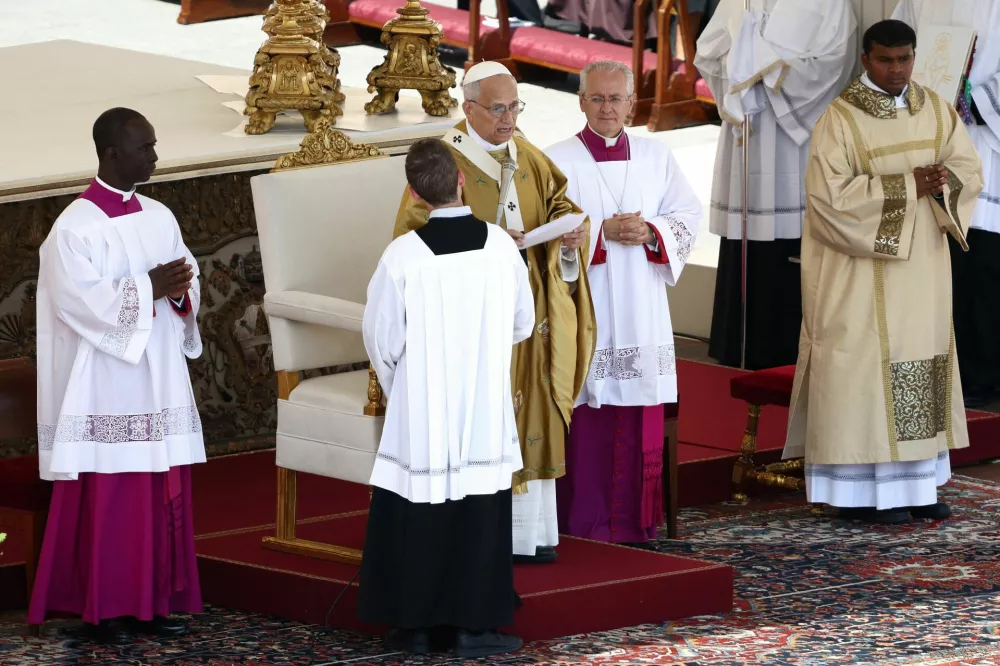 Pope Leo XIV leads the Angelus prayer on the day of a Holy Mass for the canonisation of Carlo Acutis, a British-born Italian boy who became the first millennial to be made a Catholic saint, and Pier Giorgio Frassati, in St. Peter's Square at the Vatican, September 7, 2025. REUTERS/Guglielmo Mangiapane