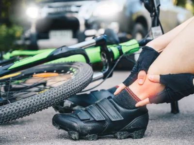 Conceptual of accident car crash with bicycle on road.