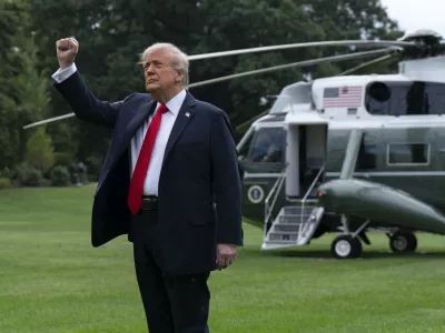 President Donald Trump gestures as leaves the White House in Washington, Sunday, Sept. 7, 2025. (AP Photo/Jose Luis Magana)