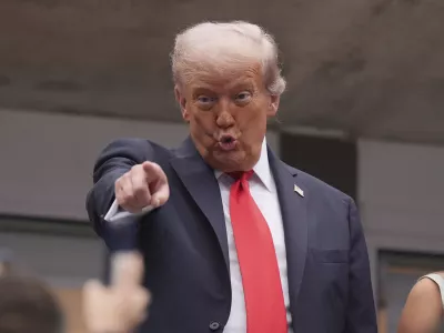 President Donald Trump attends the men's singles final of the U.S. Open tennis championships, Sunday, Sept. 7, 2025, in New York. (AP Photo/Seth Wenig)