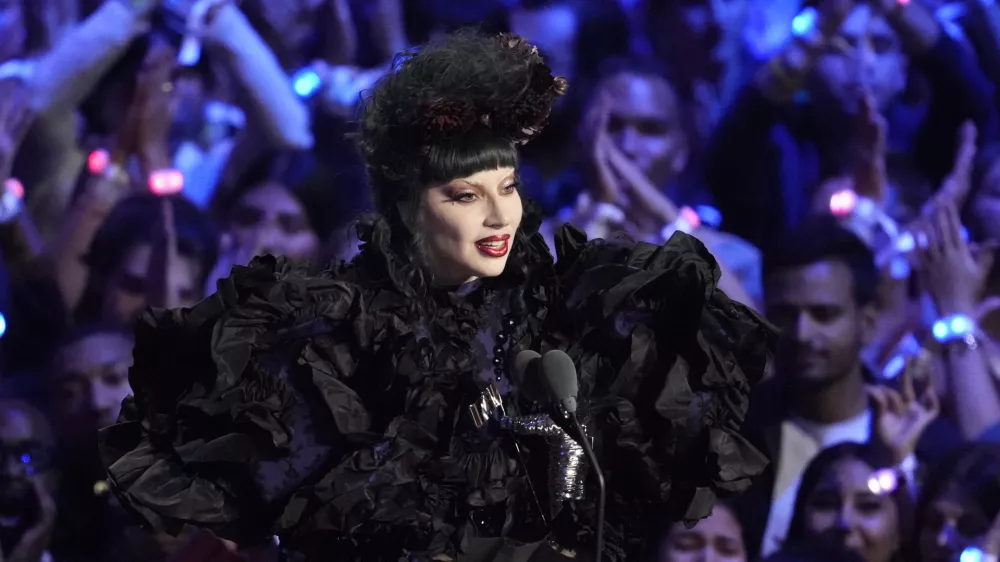 Lady Gaga accepts the award for artist of the year during the MTV Video Music Awards on Sunday, Sept. 7, 2025, at UBS Arena in Elmont, N.Y. (Photo by Charles Sykes/Invision/AP)
