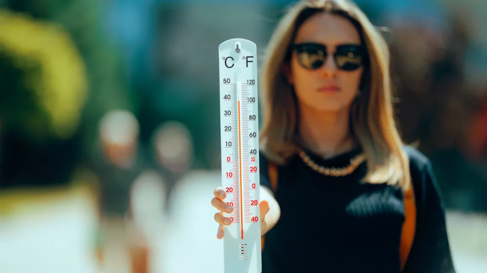 Hot day raising degrees in the thermometers and unhealthy discomfort
