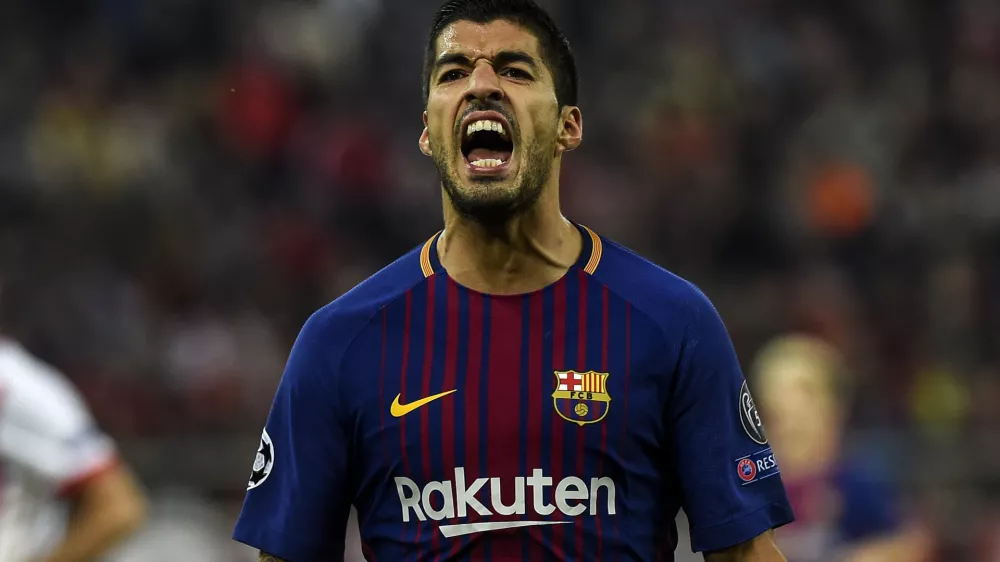 FILED - 01 November 2017, Greece, Athens: Barcelona's Luis Suarez reacts during the UEFA Champions League Group D soccer match between Olympiacos and FC Barcelona at the Karaiskaki stadium in Piraeus. Italian police are investigating possible irregularities in the Italian language exam taken by Uruguayan striker Luis Suarez at the University for Foreigners in Perugia in order to obtain an Italian passport. Photo: Angelos Tzortzinis/dpa