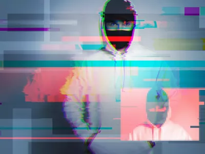 Creative image with anonymous hacker with glitch and interference effects. Concept of cybersecurity. / Foto: Jun