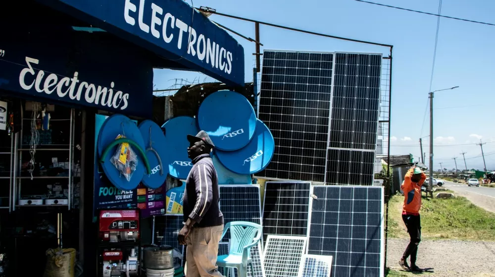 An electronic shop displaying solar panels among other products near Nyeri Town.,Image: 907082204, License: Rights-managed, Restrictions: *** World Rights ***, Model Release: no