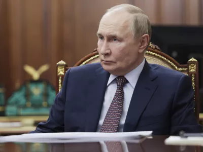 Russian President Vladimir Putin listens to Director General of the Agency for Strategic Initiatives (ASI) Svetlana Chupsheva during their meeting at the Kremlin in Moscow, Thursday, Sept. 11, 2025. (Vyacheslav Prokofyev, Sputnik, Kremlin Pool Photo via AP)