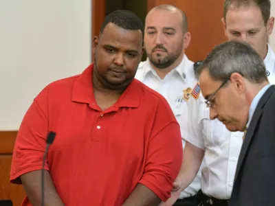 (Worcester, Ma 083117) Joshua Hubert is escorted into the court room for his dangerousness hearing on charges related to the kidnapping of a seven year old girl. At right is his attorney Richard Welsh Jr. August 31, 2017 Staff photo by Chris Christo (Photo by Chris Christo/MediaNews Group/Boston Herald via Getty Images)