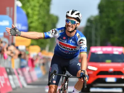 Cycling - Giro d'Italia - Stage 12 - Martinsicuro to Fano - Italy - May 16, 2024 Soudal Quick-Step's Julian Alaphilippe celebrates after winning stage 12 REUTERS/Jennifer Lorenzini
