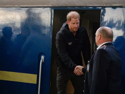 In this photo provided by the Railway of Ukraine Ukrzaliznytsia on Friday, Sept. 12, 2025, Britain's Prince Harry arrives on central railway station in Kyiv region, Ukraine. (Railway of Ukraine Ukrzaliznytsia via AP)