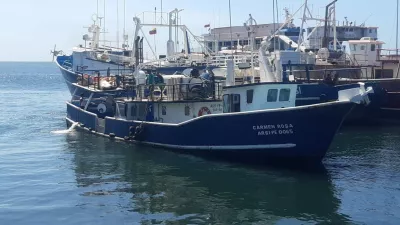 People stand aboard Venezuelan fishing vessel "Carmen Rosa", which, according to the Venezuelan government was allegedly intercepted by a U.S. warship in Caribbean waters on Friday, in this handout image taken at an unidentified location and released on September 13, 2025. Venezuela's Ministry of Communication and Information/Handout via REUTERS  THIS IMAGE HAS BEEN SUPPLIED BY A THIRD PARTY. MANDATORY CREDIT. NO RESALES. NO ARCHIVES. VENEZUELA OUT. NO COMMERCIAL OR EDITORIAL SALES IN VENEZUELA. VERIFICATION - Reuters was not able to independently verify the location and date.