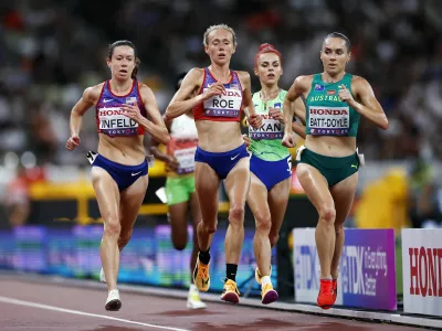 World Athletics Championships Tokyo 2025 - Women's 10,000m Final - Japan National Stadium, Tokyo, Japan - September 13, 2025 Emily Infeld of the U.S., Taylor Roe of the U.S., Slovenia's Klara Lukan and Australia's Isobel Batt-Doyle in action REUTERS/Sarah Meyssonnier
