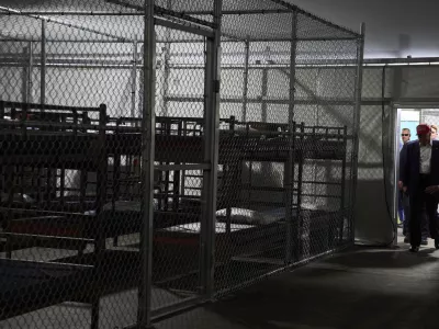 FILE - President Donald Trump tours "Alligator Alcatraz," a new migrant detention facility at Dade-Collier Training and Transition facility, on July 1, 2025, in Ochopee, Fla. (AP Photo/Evan Vucci, File)