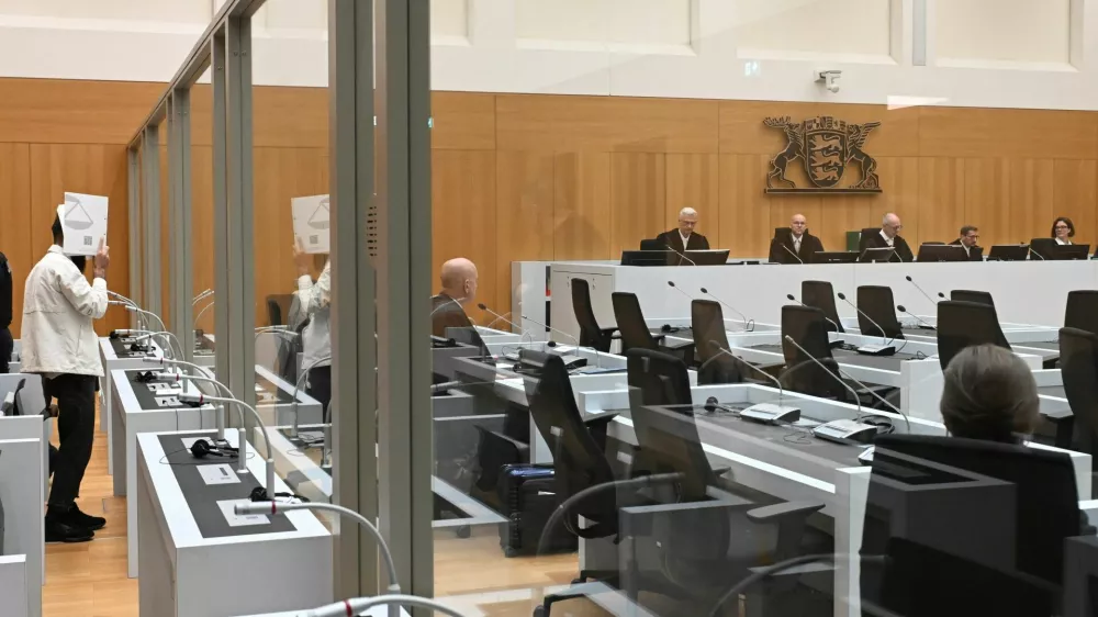 The defendant Sulaiman A stands in the courtroom of the Higher Regional Court in Stuttgart-Stammheim, Germany, on September 16, 2025, for his trial verdict for murdering a police officer and injureing five others with suspected Islamist motives at an anti-Islam rally at a market square in Mannheim in late May 2024. THOMAS KIENZLE/Pool via REUTERS