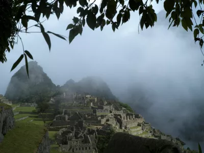 FILE PHOTO: Fog is seen around the Incan ruins of Machu Picchu, a tourism magnet, outside Cuzco, Peru, April 18, 2022. REUTERS/Alessandro Cinque/File Photo