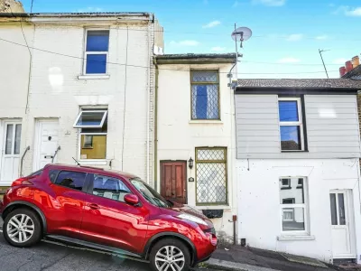 The 7ft wide Victorian property in Chatham, Kent. One of Britain's thinnest homes is up for auction - a two-bedroom terrace house standing at just 7ft wide. The empty Victorian property in Chatham, Kent, is being auctioned this week with a guide price of just �75,000. The fixer-upper has a bedroom which is a tiny 4ft 7ins wide and the total floorspace for the house is a measly 49 sq metres. Photo released 15/09/2025,Image: 1037660187, License: Rights-managed, Restrictions: Editorial use, commercial use may require additional licenses. We don't use AI to make images which could be mistaken for news photos. AI use will be clearly indicated. Supplied on condition you ensure personal data is processed in compliance with UK GDPR, Model Release: no