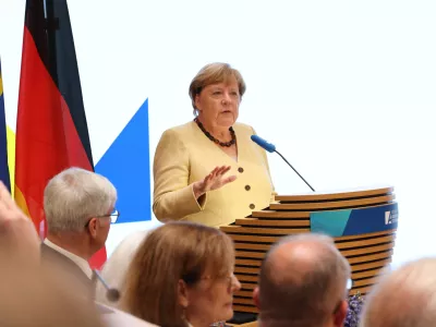 HANDOUT - 16 September 2025, Berlin: Former German Chancellor Angela Merkel speaks about lessons from the EU Treaty of Lisbon at a symposium organized by the Konrad Adenauer Foundation (KAS). Photo: Gerd Markert/KAS/dpa - ATTENTION: editorial use only in connection with the latest coverage and only if the credit mentioned above is referenced in full