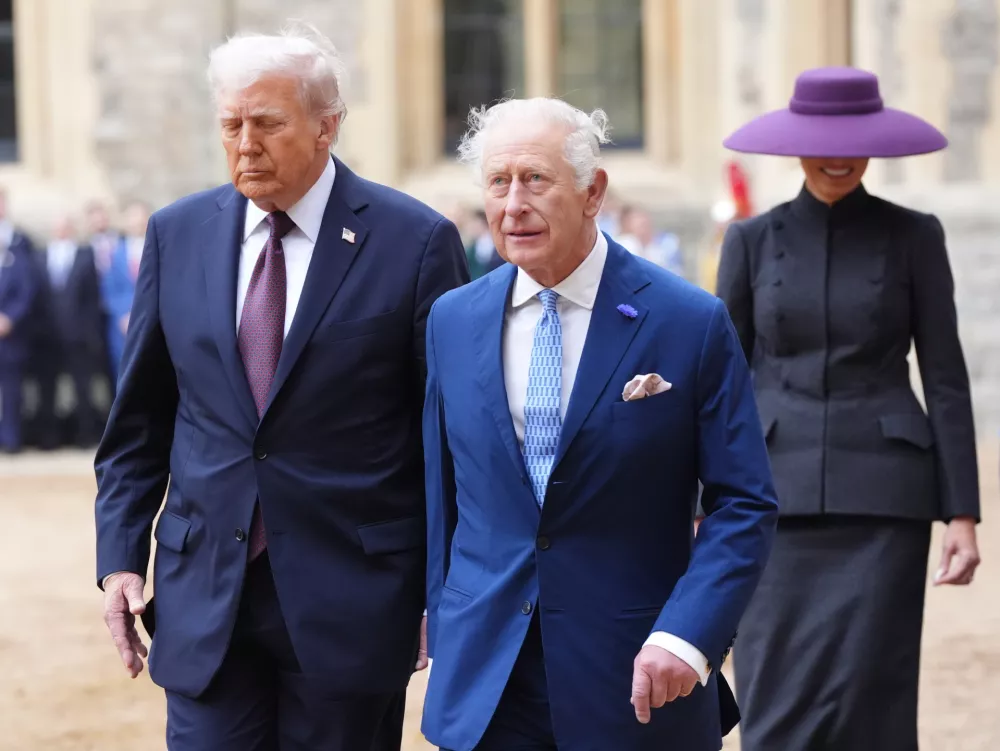17 September 2025, United Kingdom, Windsor: US President Donald Trump (L) and King Charles III, during the ceremonial welcome at Windsor Castle on the first day of his second state visit to the UK. Photo: Jonathan Brady/PA Wire/dpa