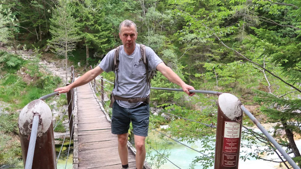 Edvin Kravanja, vodnik v TNP, Triglavski narodni park, 2021- 40. obletnica ustanovitve, Trenta, So&scaron;ka pot, Soča, pohodniki, Posočje / Foto: Nata&scaron;a Bucik Ozebek