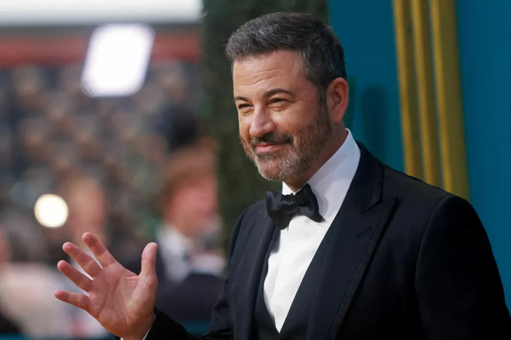 FILE PHOTO: Jimmy Kimmel arrives at the 74th Primetime Emmy Awards held at the Microsoft Theater in Los Angeles, U.S., September 12, 2022. REUTERS/Aude Guerrucci/File Photo
