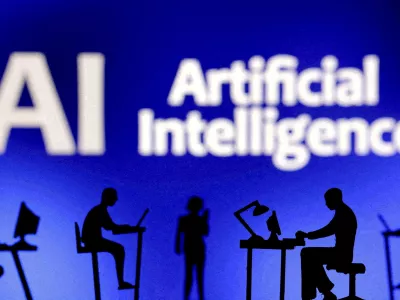 FILE PHOTO: Figurines with computers and smartphones are seen in front of the words "Artificial Intelligence AI" in this illustration taken, February 19, 2024. REUTERS/Dado Ruvic/Illustration/File Photo