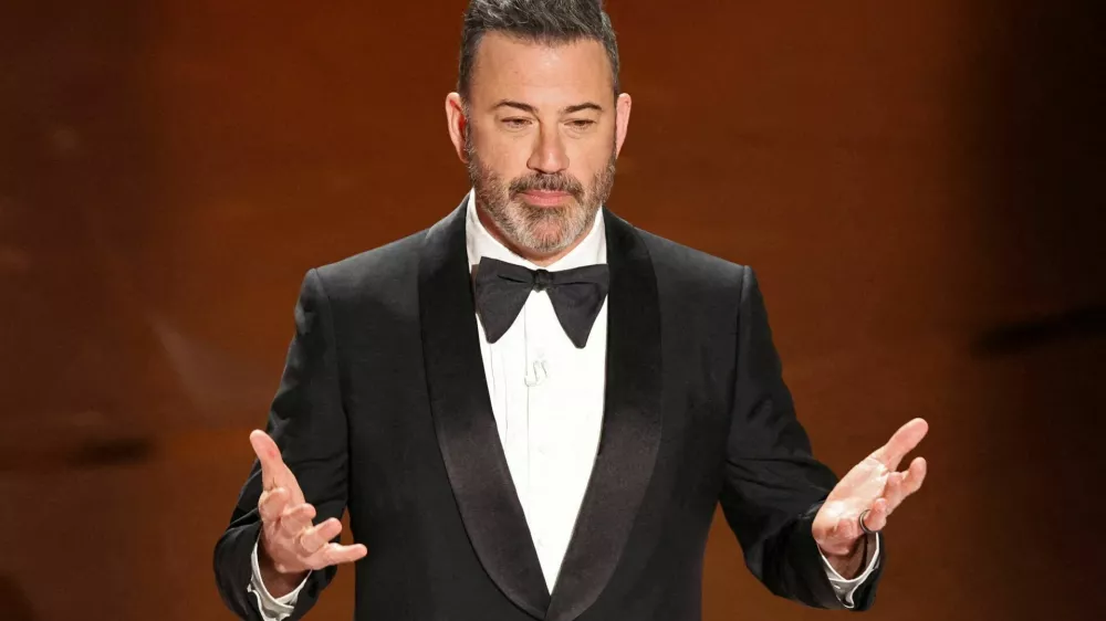 FILE PHOTO: Show host Jimmy Kimmel delivers his opening monologue at the 96th Academy Awards in Hollywood, Los Angeles, California, U.S., March 10, 2024. REUTERS/Mike Blake/File Photo