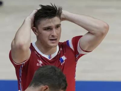 Theo Faure of France reacts after losing to Argentina during their pool phase match at the 2025 FIVB Volleyball Men's World Championship in Quezon city, Philippines on Thursday, Sept. 18, 2025. (AP Photo/Aaron Favila)