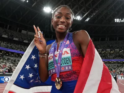 World Athletics Championships Tokyo 2025 - Women's 200m Final - Japan National Stadium, Tokyo, Japan - September 19, 2025 Melissa Jefferson-Wooden of the U.S. celebrates after winning the gold medal REUTERS/Aleksandra Szmigiel